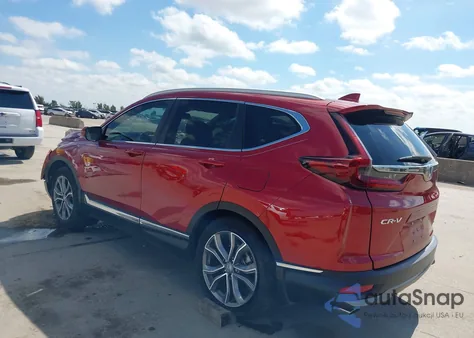 2021 Honda Cr-V 2Wd Touring from USA, damaged, VIN 2HKRW1H9XMH412143